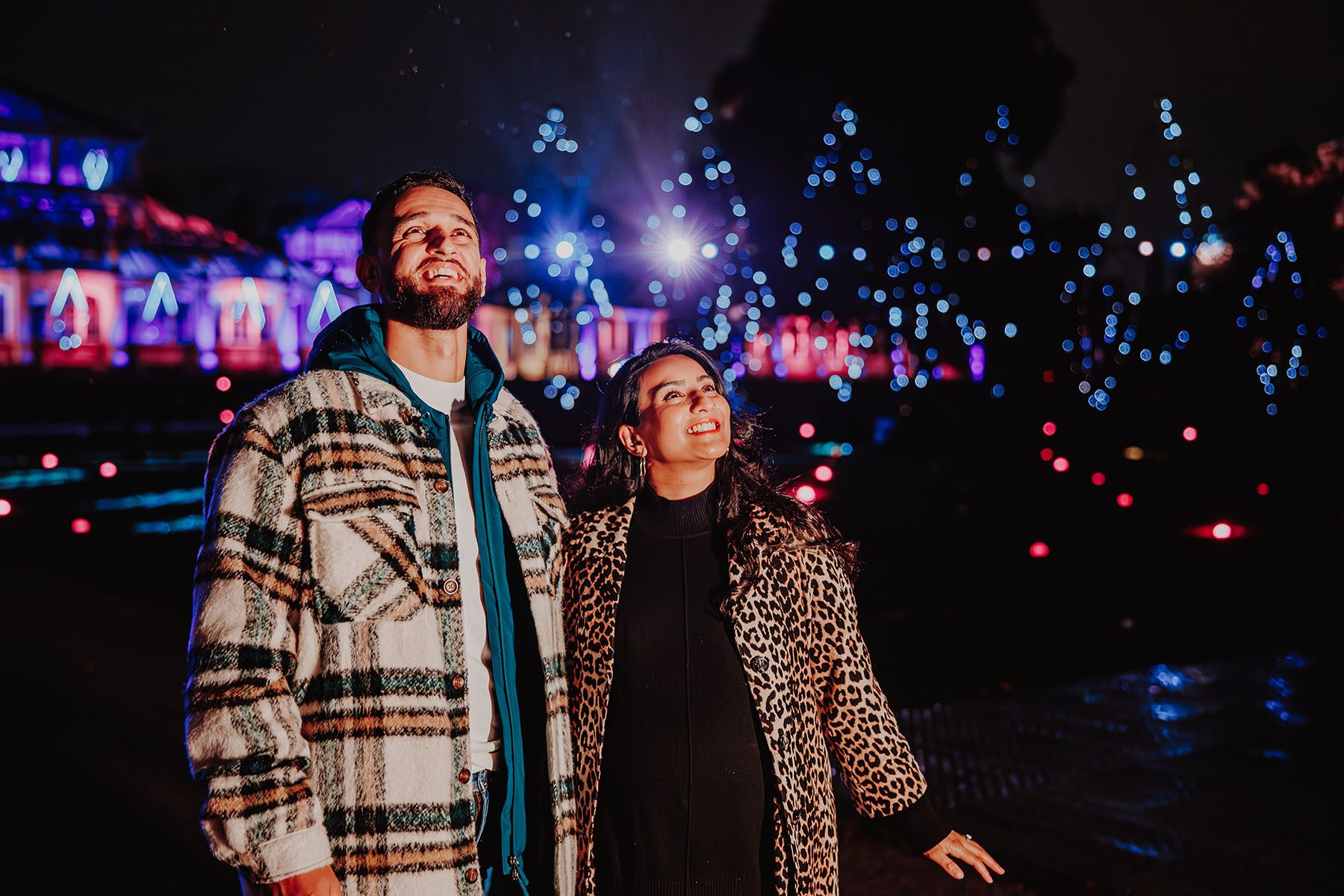 A couple at RGB Kew Christmas lights