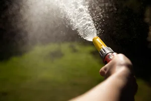 Gardening with a hose pipe Gardening with a hose pipe