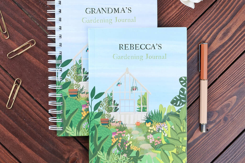 Personalised Gardening Journals on a wooden table