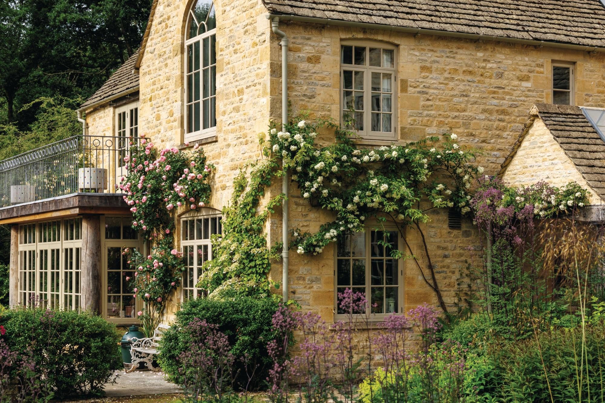 House with roses trailing around the walls