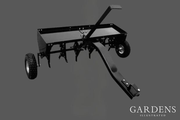 The Handy 101cm (40") Plug Aerator on a grey background