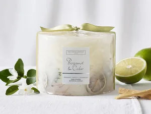 The White Company Bergamot & Cedar Botanical Candle – Large The White Company Bergamot & Cedar Botanical Candle – Large on a table