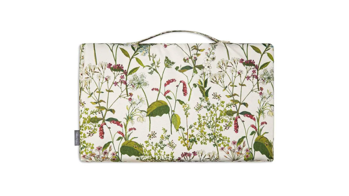 Celina Digby Luxury Garden Kneeler Kneeling Pad Welsh Meadow A floral garden kneeler on a white background.