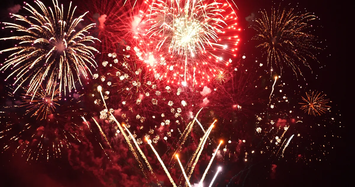 Colorful vibrant Firework celebrate anniversary happy new year 2022, 4th of july holiday festival. colorful firework in the night time to celebrate national holiday. countdown new year 2022 party time Colorful vibrant Firework celebrate anniversary happy new year 2022, 4th of july holiday festival. colorful firework in the night time to celebrate national holiday. countdown new year 2022 party time