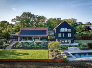 Landform Consultants Catherine MacDonald surrey A house with black front and garden