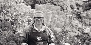 Georgie Newbury Woman stood in garden