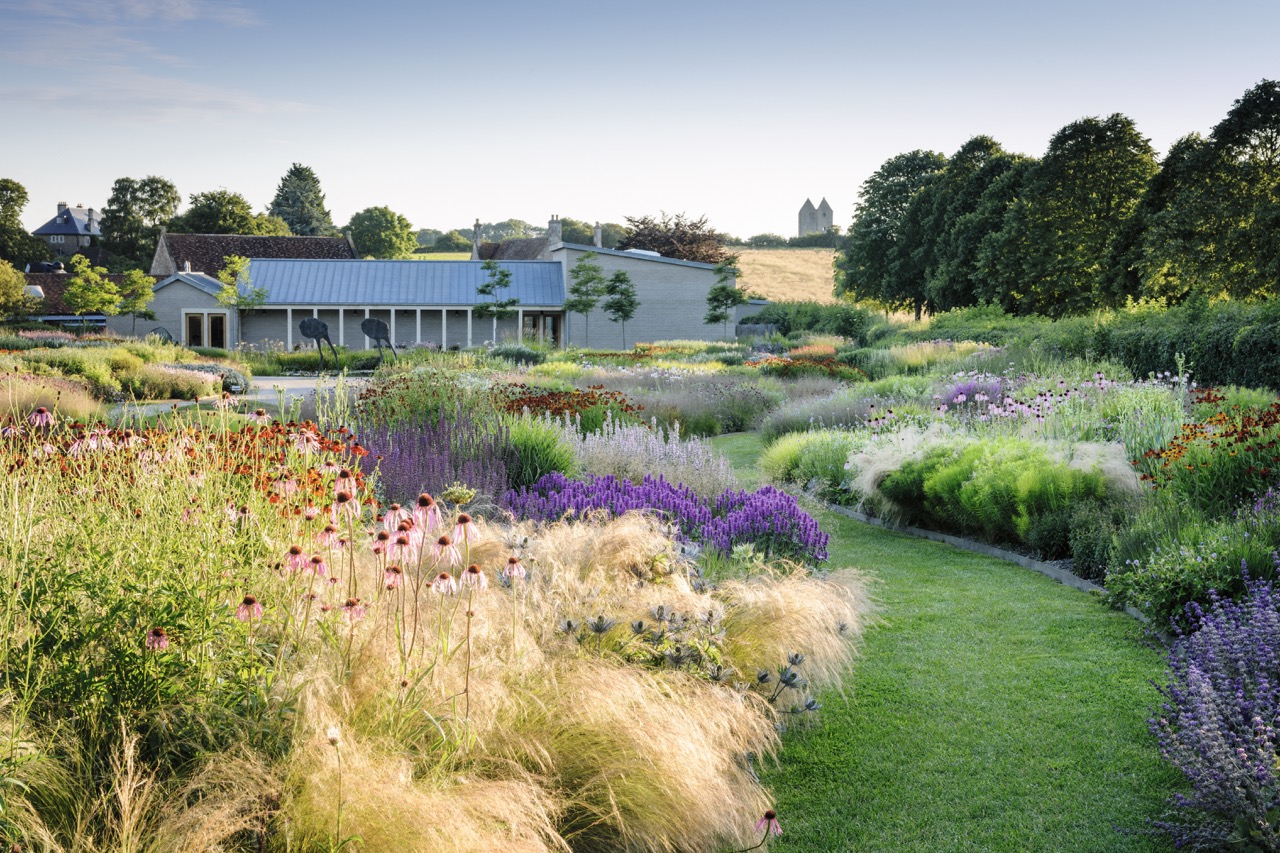 Meandering grass path amongst planting at Piet Oudolf Field - Hauser & Wirth, Somerset
