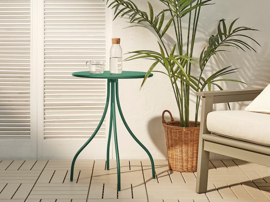 TÅNEBRO indoor/outdoor side table in dark green in a home