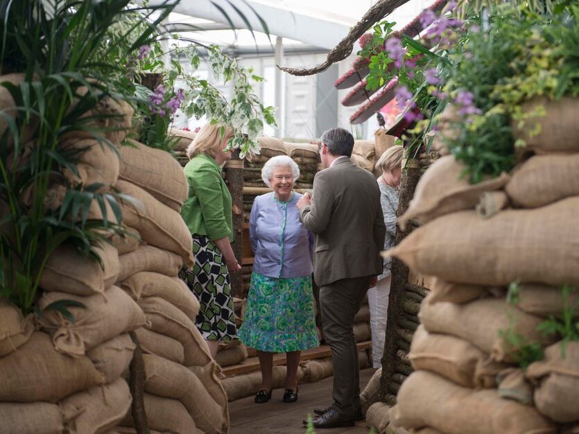 Queen Elizabeth II visits the WW1 Centenary garden in the Great Pavilion at the RHS Chelsea Flower Show 2014.