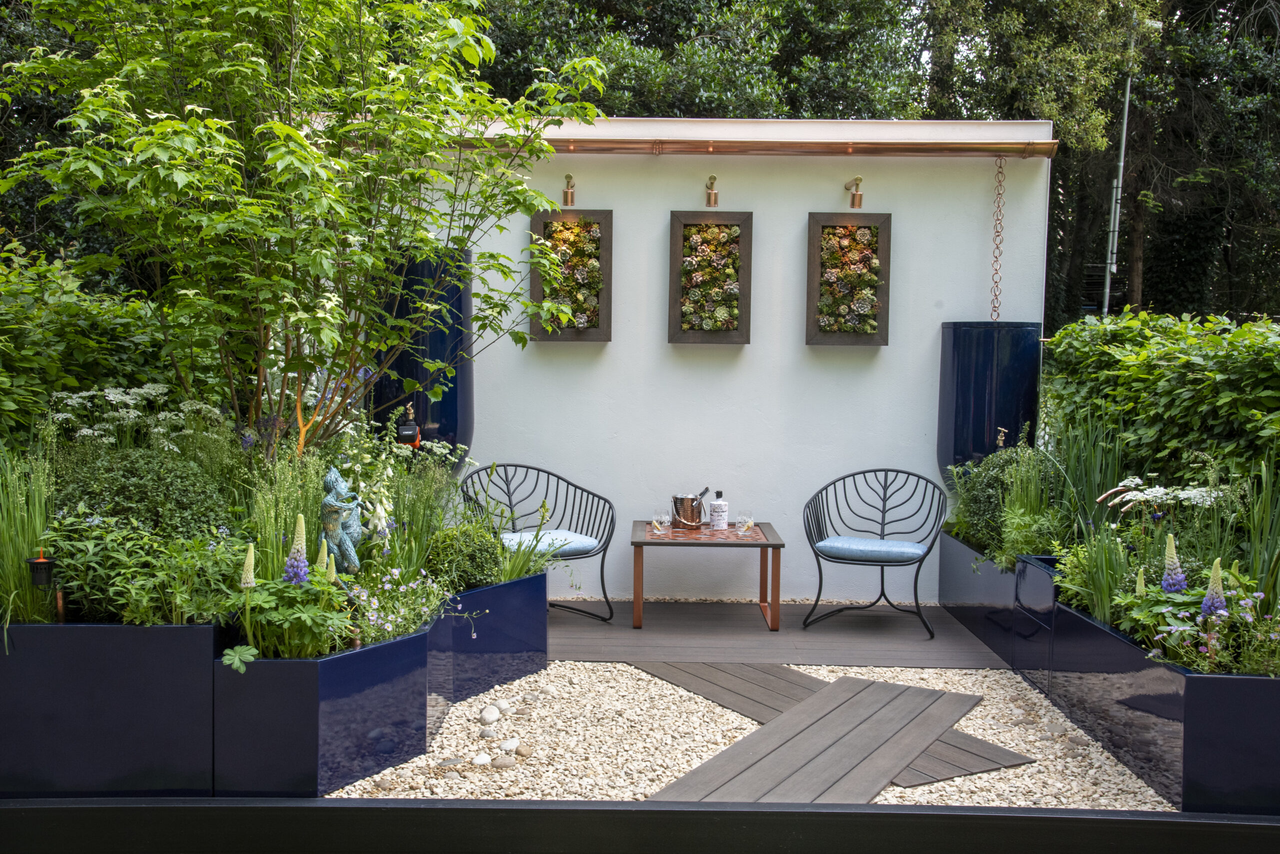 The Water Saving Garden supported by Affinity Water at RHS Chelsea Flower Show. Designed by Sam Proctor. Sponsored by Affinity Water. Container Garden.
