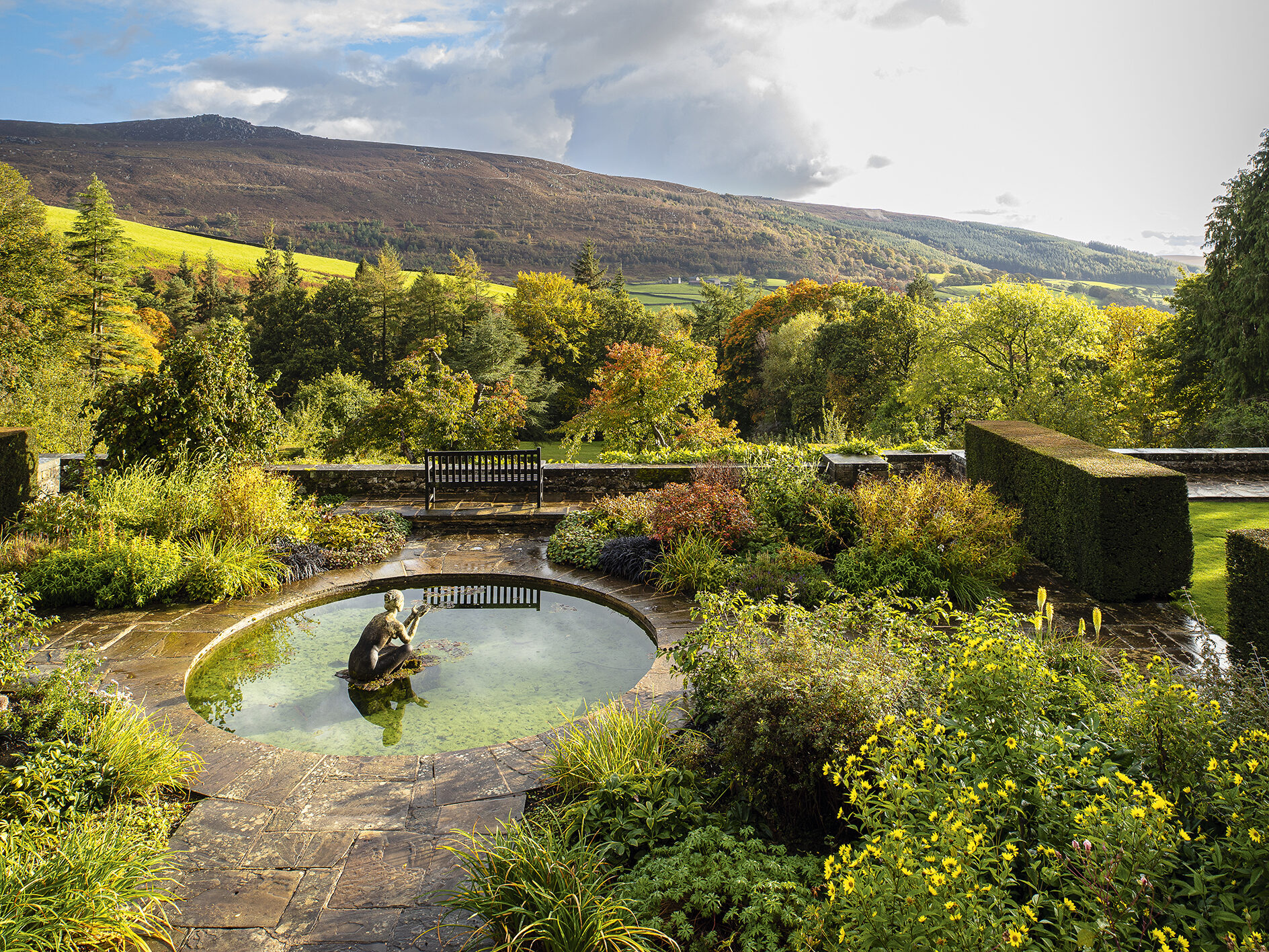 Statue in pool at Parcevall Hall in North Yorkshire