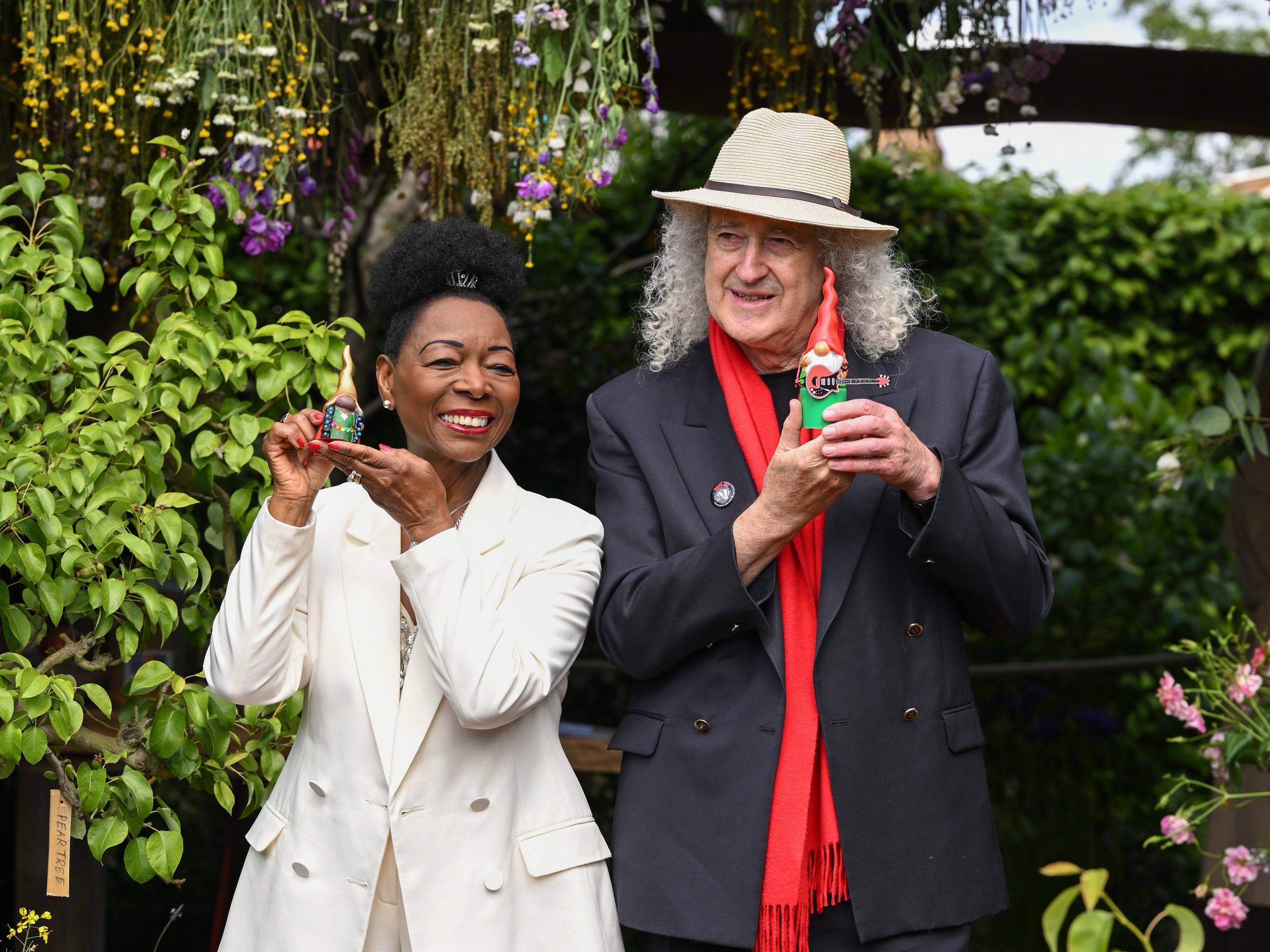 Baroness Dame Floella Benjamin and Sir Brian May pose with their painted gnomes to be auctioned as they attend the RHS Chelsea Flower Show 2026 ©&nbsp;Jeff Spicer/Getty Images Baroness Dame Floella Benjamin and Sir Brian May pose with their painted gnomes to be auctioned as they attend the RHS Chelsea Flower Show 2026 ©&nbsp;Jeff Spicer/Getty Images