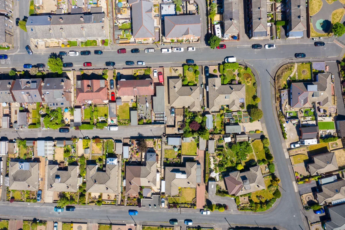 Aerial photo of the village of Cleckheaton in Yorkshire in the UK showing a top down view of a typical British housing estate, taken in a sunny summer Aerial photo of the village of Cleckheaton