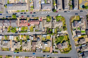 Aerial photo of the village of Cleckheaton in Yorkshire in the UK showing a top down view of a typical British housing estate, taken in a sunny summer Aerial photo of the village of Cleckheaton