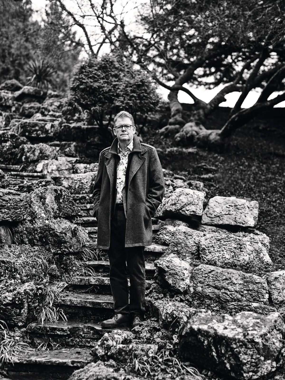 Boyd Douglas-Davis chair of Greenfingers Charity Man stood in garden