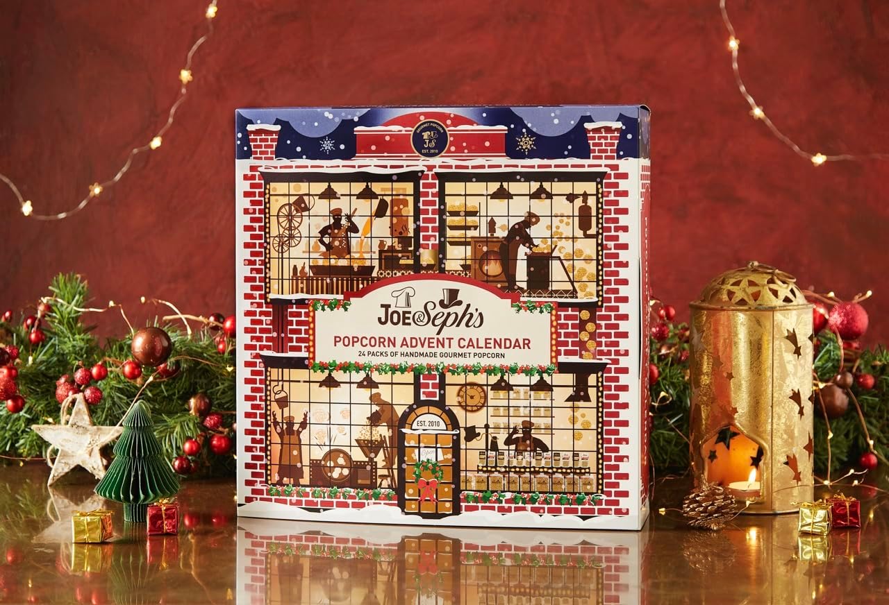 Joe & Seph’s Classic Gourmet Popcorn Christmas Advent Calendar on a table with decorations