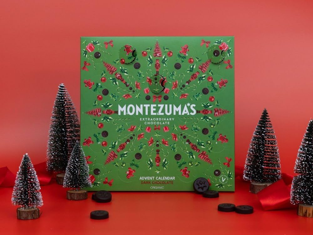 Montezuma's Christmas Dark Chocolate Organic Advent Calendar on a red background