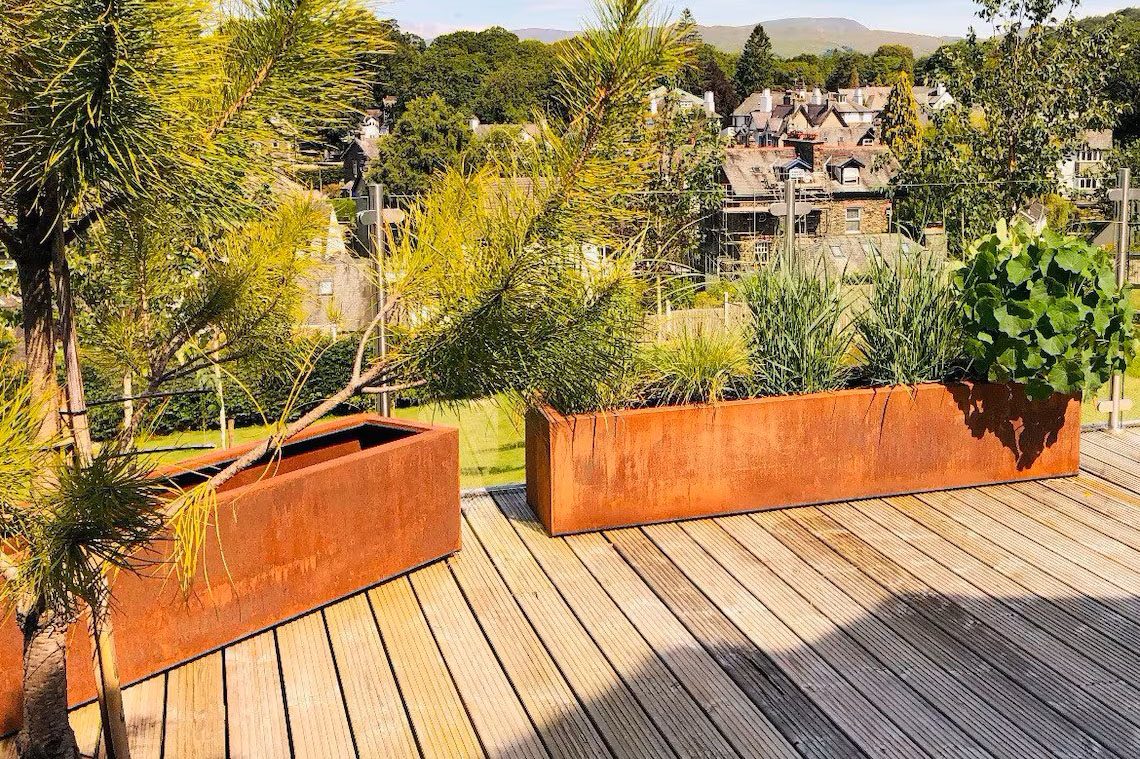 Corten Steel Trough Planter Pots on a terrace