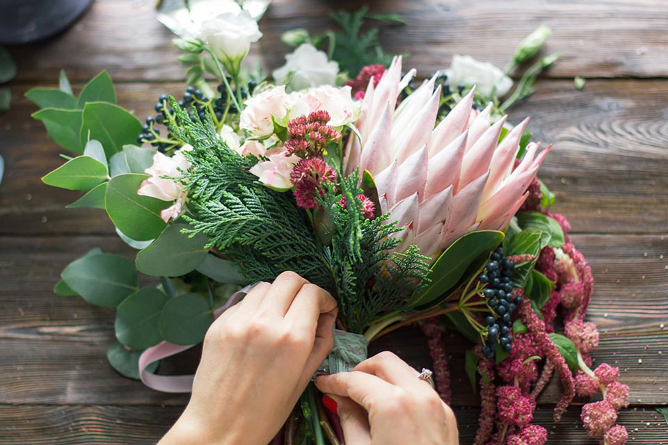 Woman making bouquet