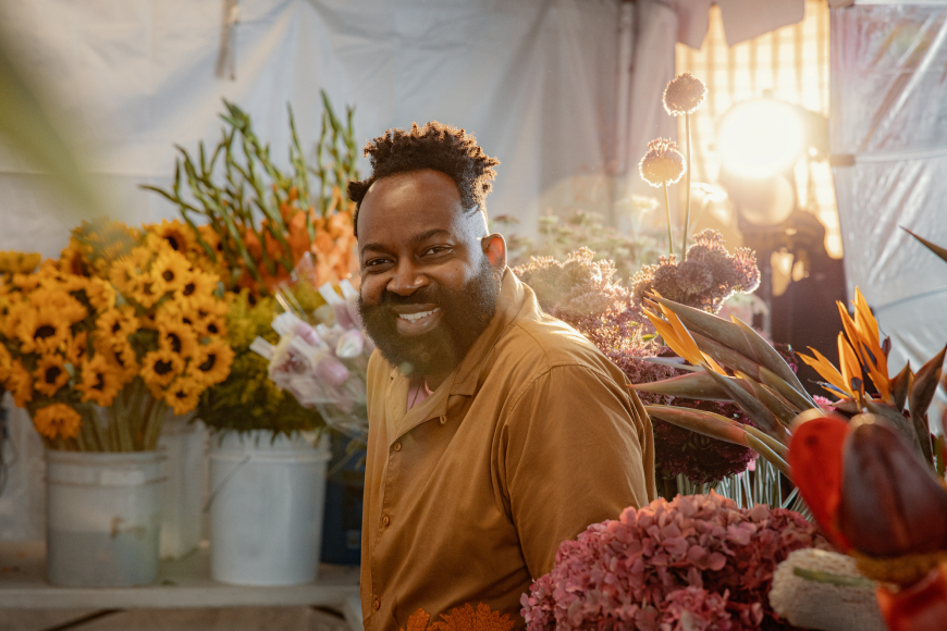 Maurice Harris amongst flowers