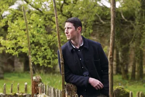 Adam Stoter Man stood in garden