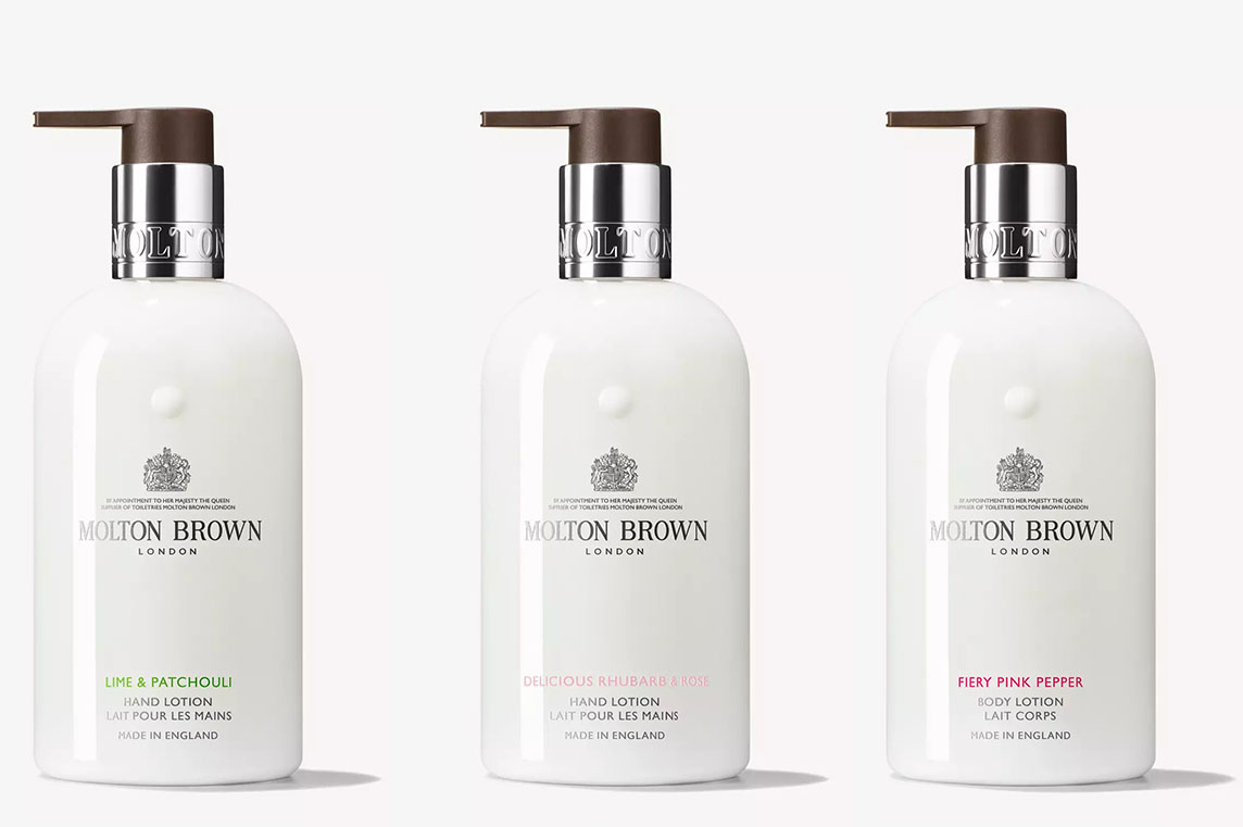 Molton Brown hand lotions on a plain background