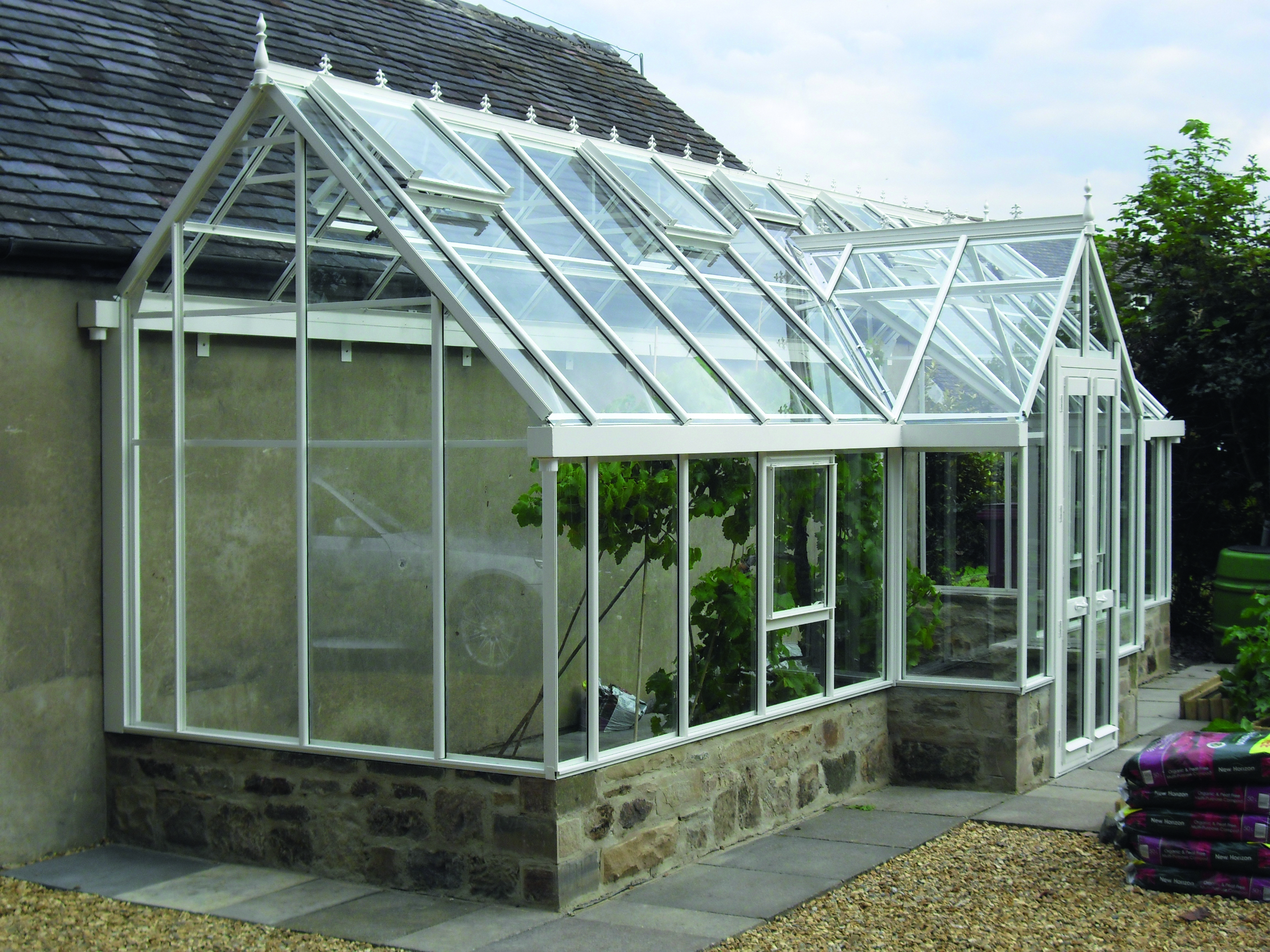 Dovetail greenhouse with dormer porch, best greenhouses with porches, best Victorian greenhouse