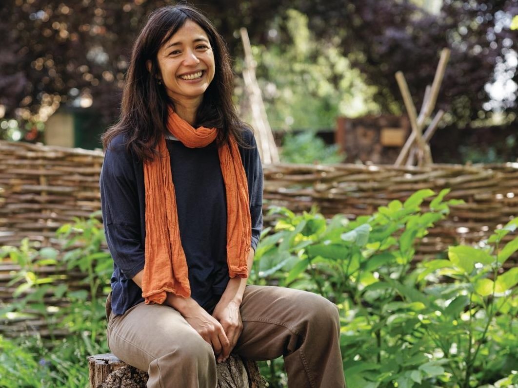 Woman sat in garden