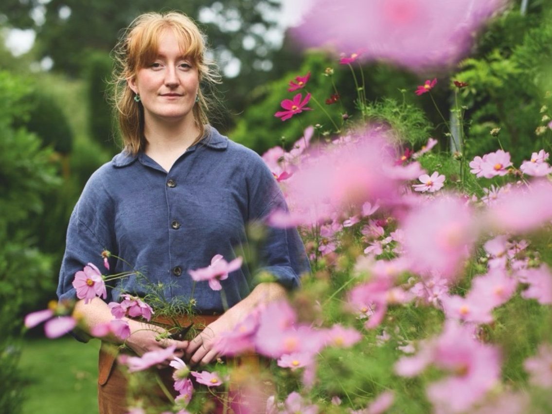 Woman stood in garden