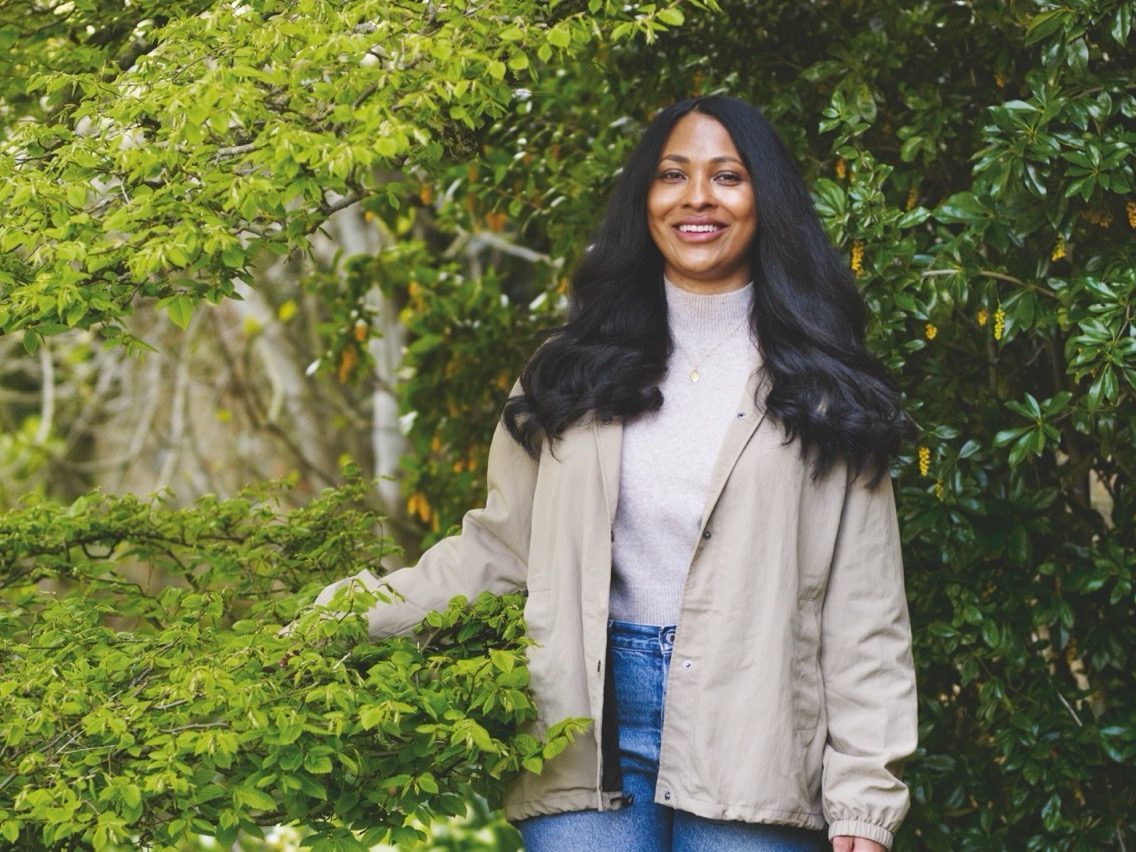 Woman stood in garden