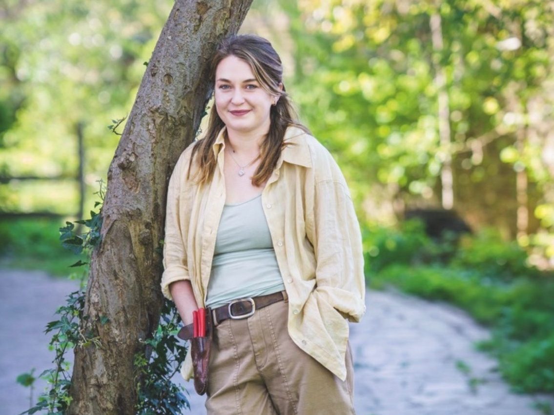 Woman stood in garden