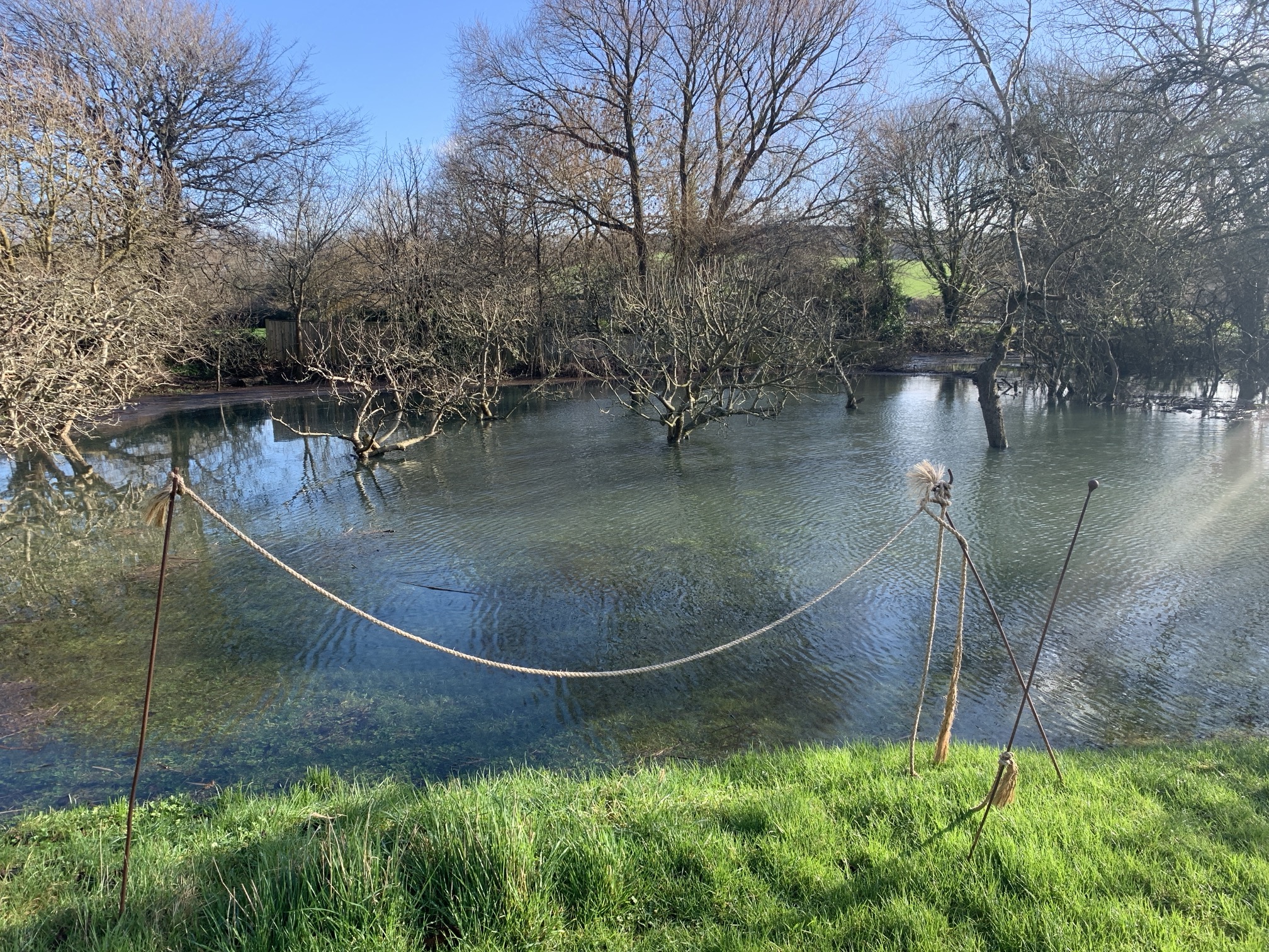 Restricted access and waterlogging in parts of the garden at Alfriston Clergy House in East Sussex