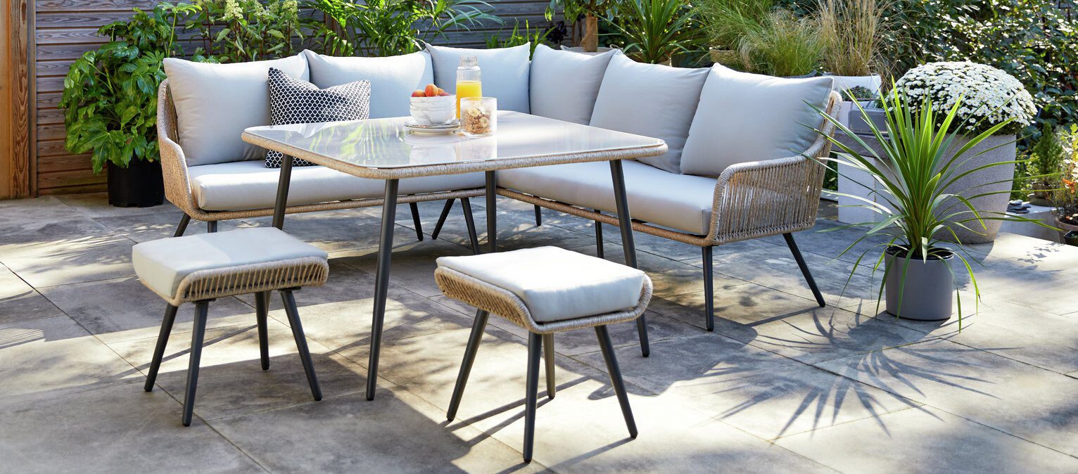 Habitat Malta 6 Seater Steel Corner Dining Set on a patio