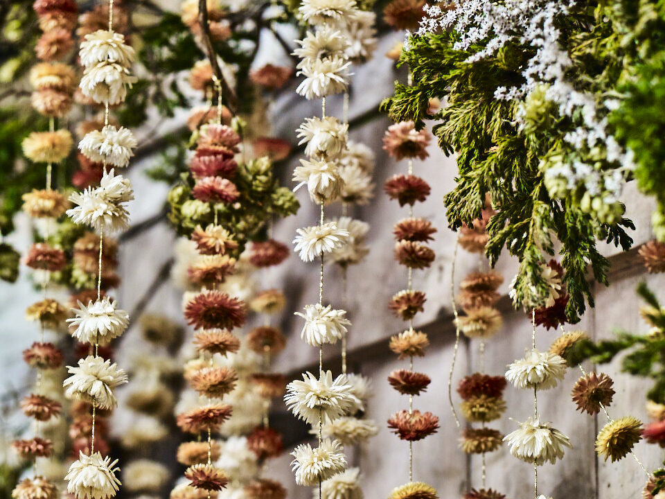 Strawflower garlands made by Bex Partridge as natural Christmas decorations