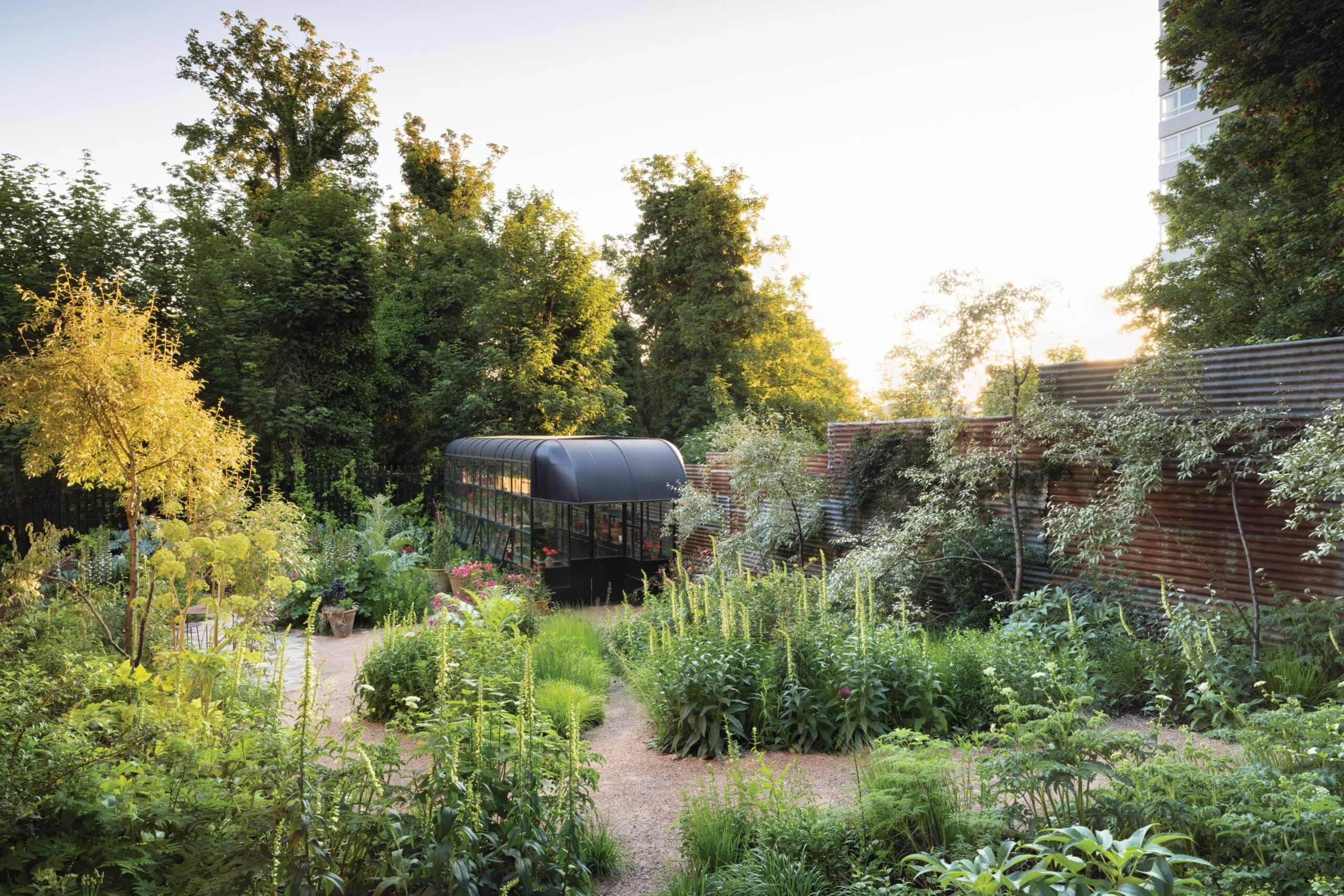 Community garden with greenhouse bus