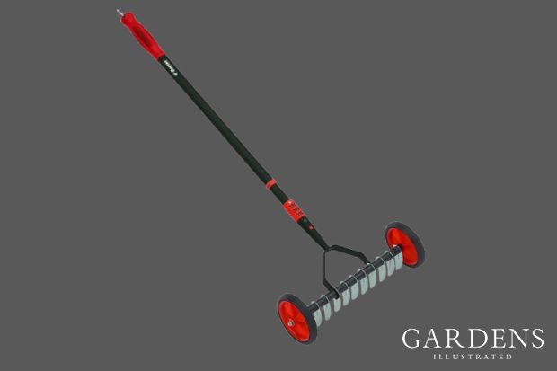 Darlac Lawn Scarifier on a grey background