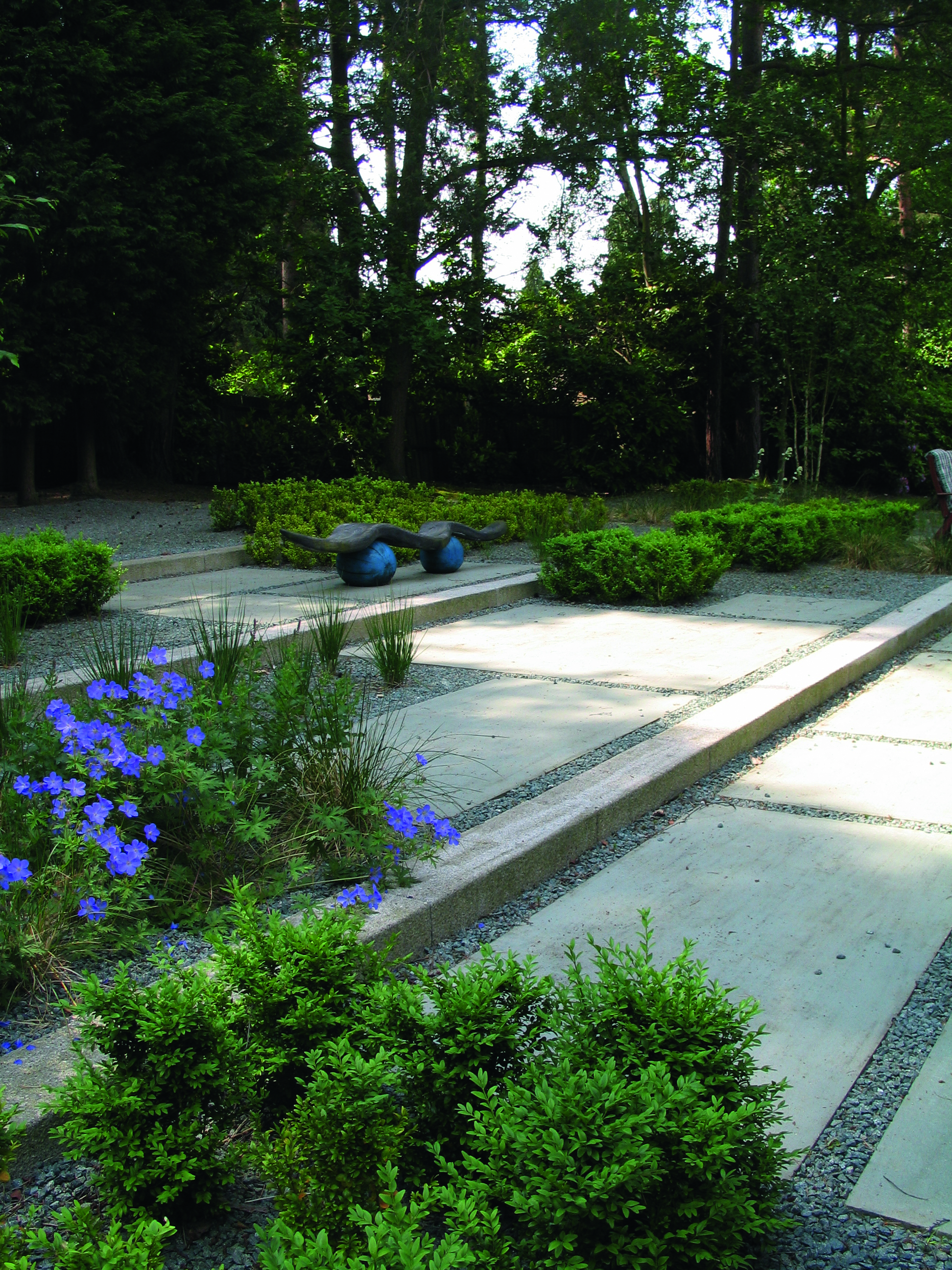 Limestone steps are a solution to coping with slopes. Wide steps create an elegant descent down a sloping garden