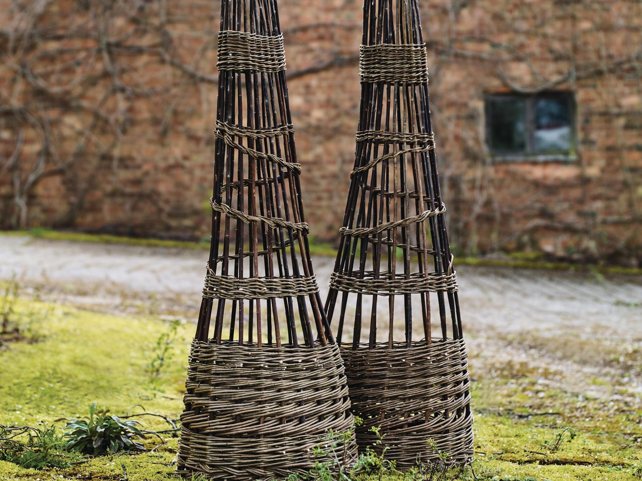 These woven willow pieces were originally made for a flower show and were decorated with peonies and roses. Suitable for indoor or outdoor use, they are available for hire or as commissioned pieces.