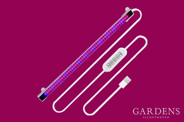 Grow Light Bar for Indoor Plants on a pink background