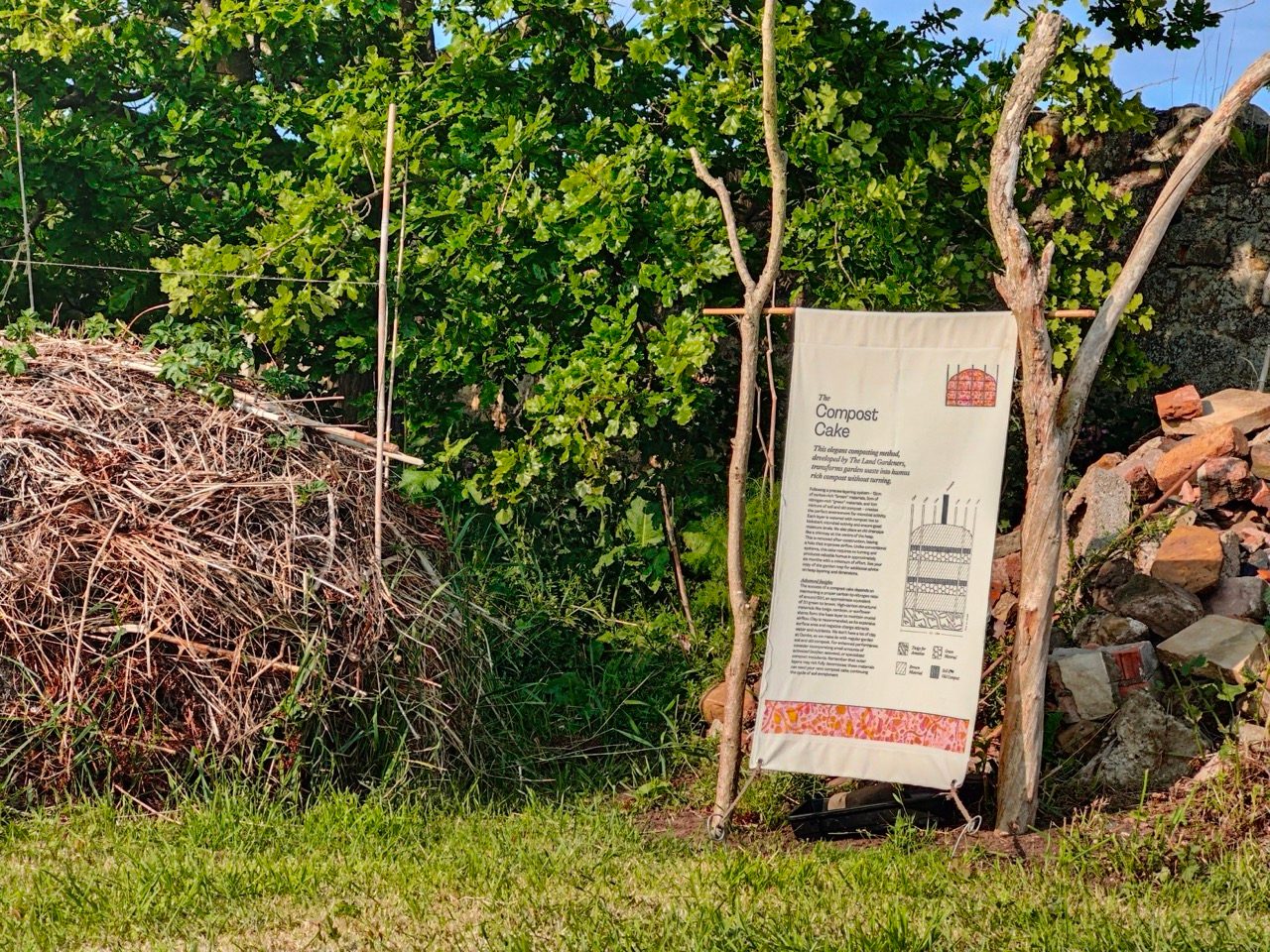 An information sign next to a compost heap