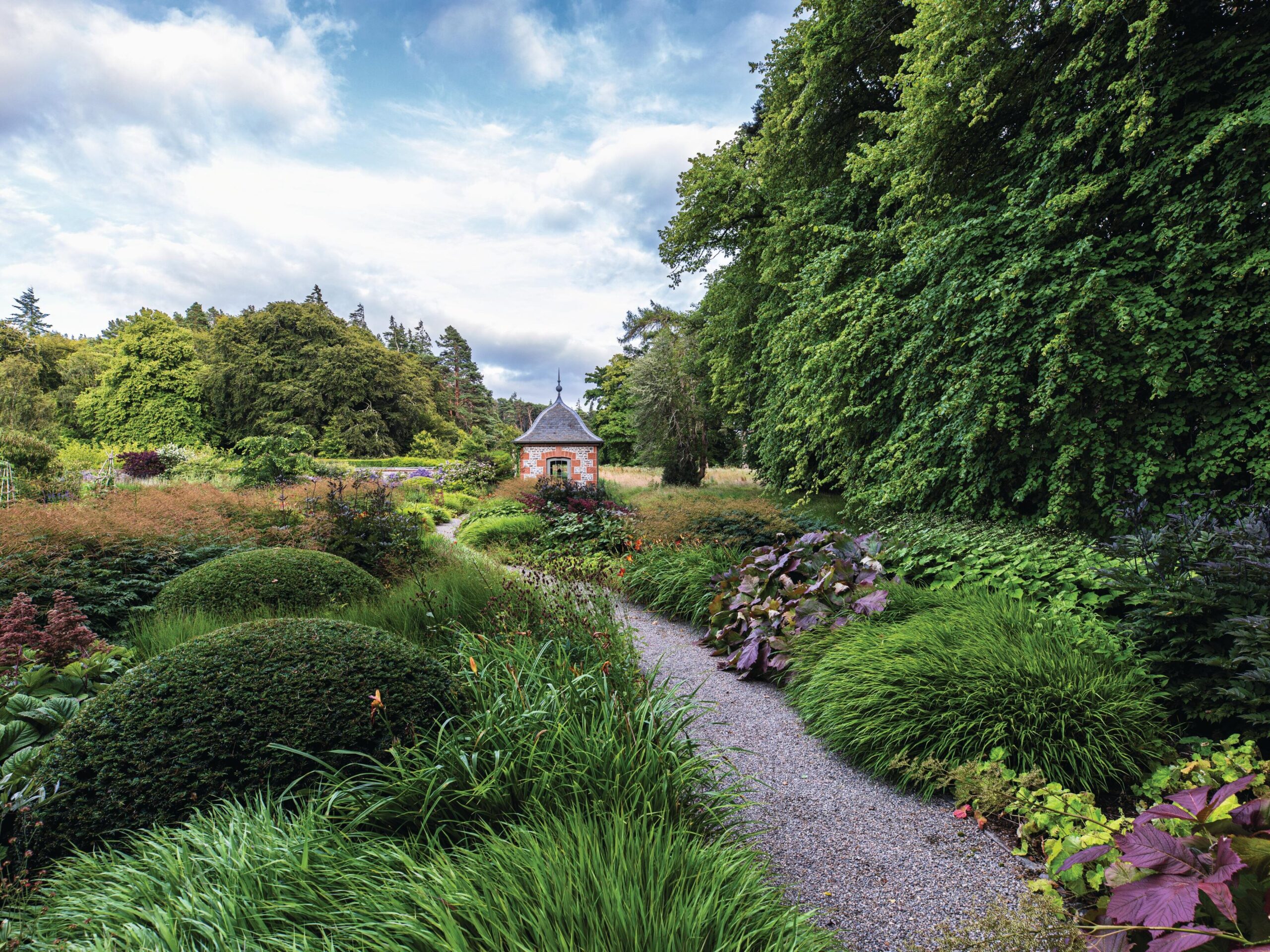 Ogee-roofed pavilion and garden path