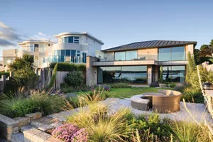 House and garden overlooking harbour in Pool designed by Helen Elks Smith House and garden