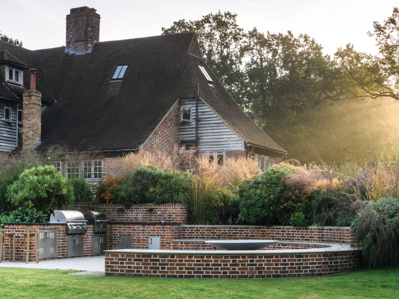House and garden with outdoor kitchen