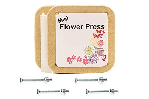 Mini flower press on a white background