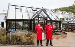 Hartley Botanic Greenhouses -96 Chelsea pensioners in front of Hartley Botanic Opus Grand Botanic greengouse Chelsea Flower Show September 2021
