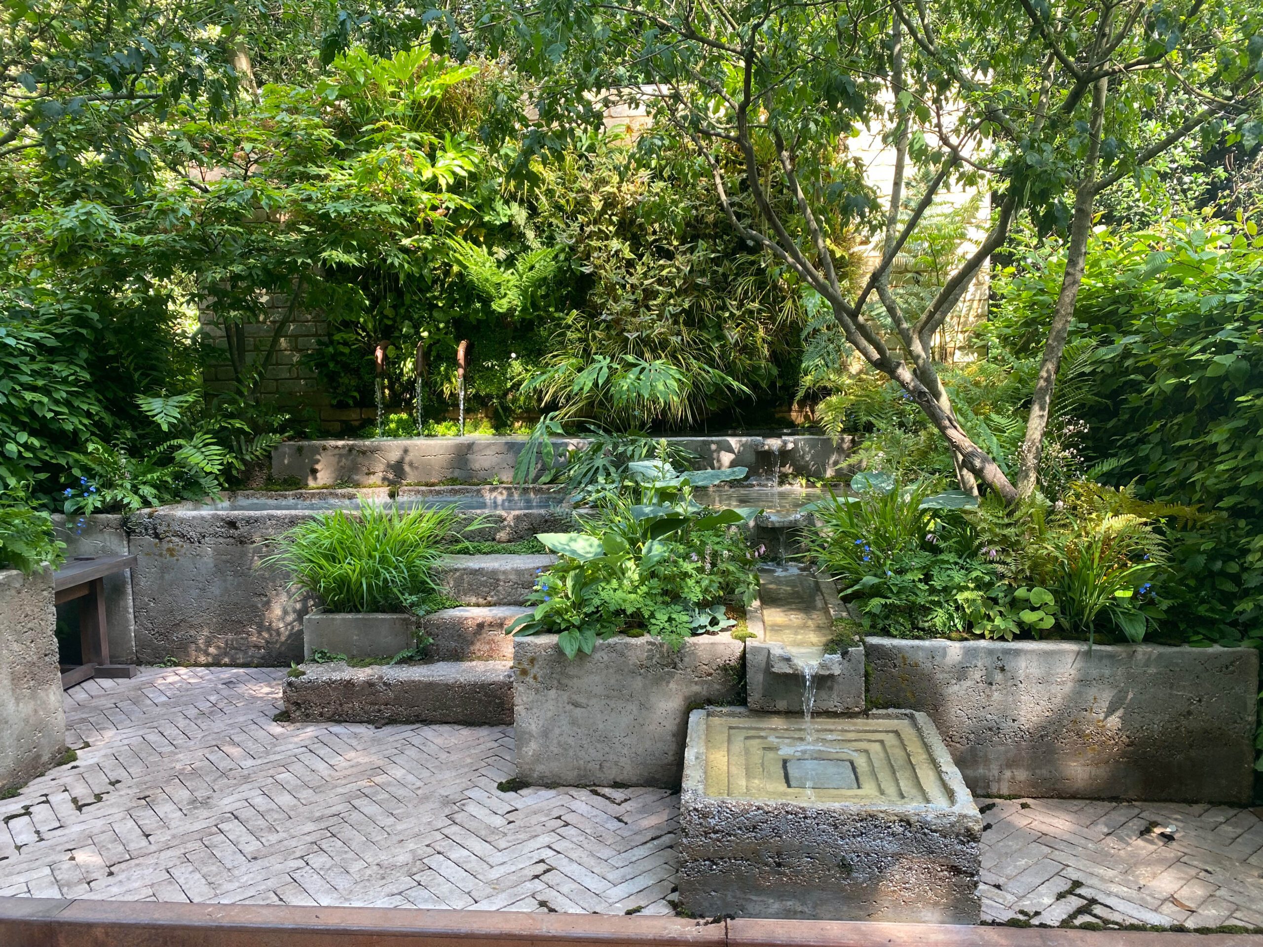 Cascading water features and plunge pool in Tom Bannister's The Ecotherapy Garden