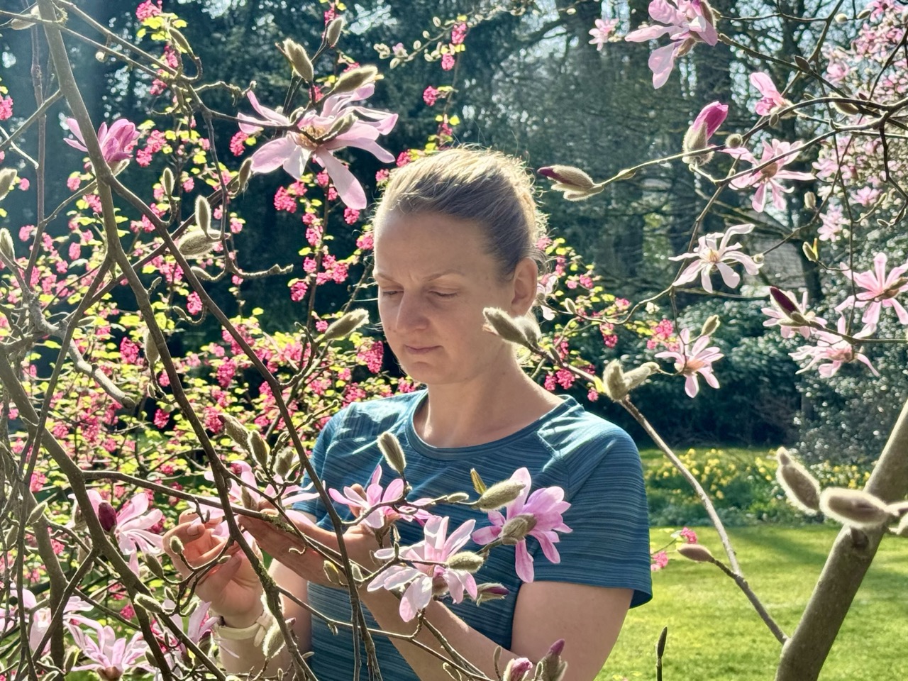 Woman and flowers in garden
