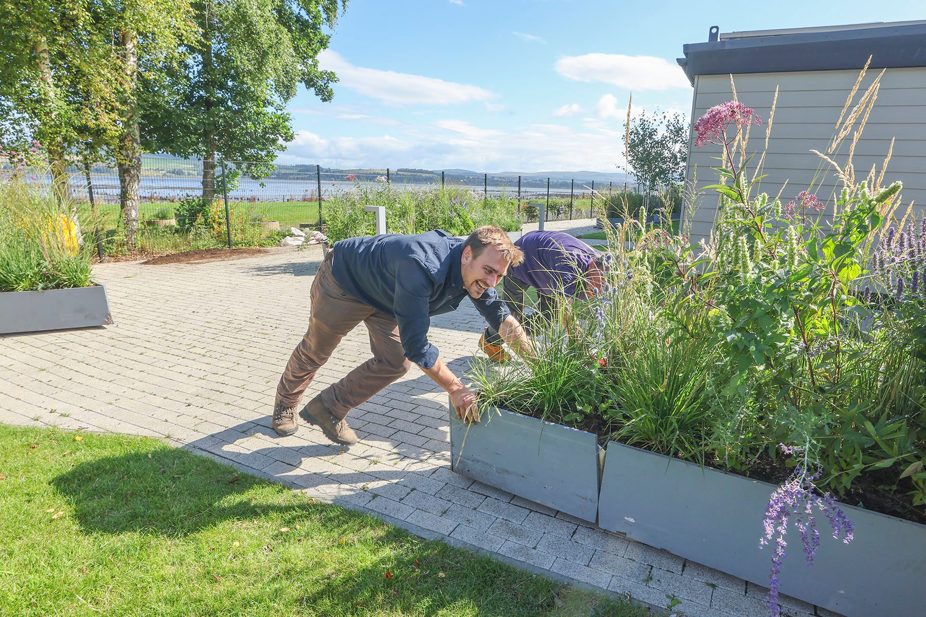 Jamie Butterworth pushing the Saltire Garden into place