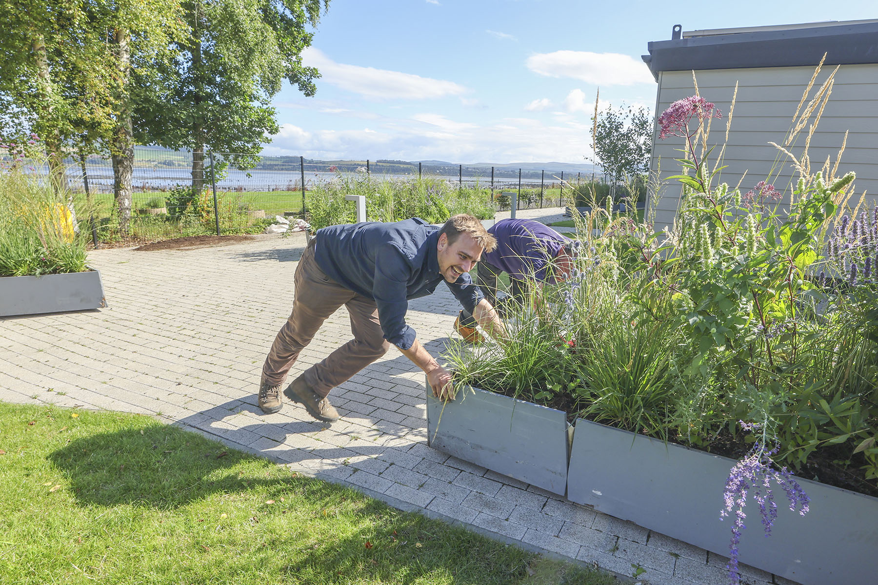 Jamie Butterworth pushing the Saltire Garden into place