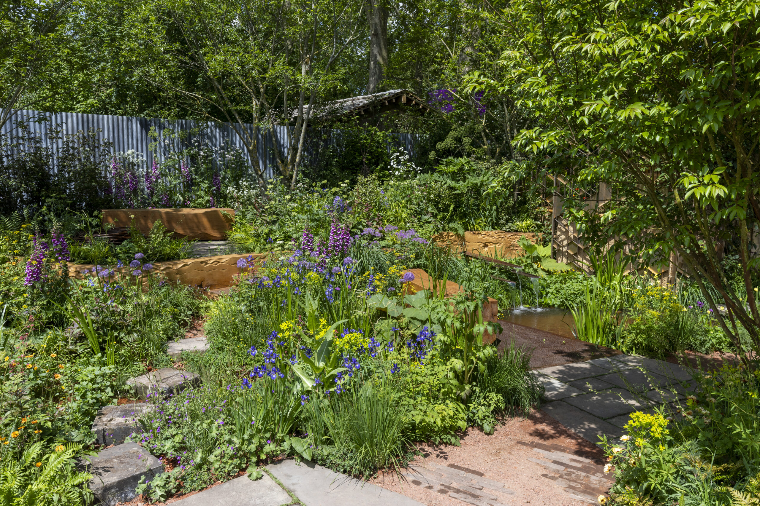 The Octavia Hill Garden by Blue Diamond with the National Trust at RHS Chelsea Flower Show 2024. Designed by Ann-Marie Powell and the Blue Diamond team.